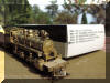 Exquisite... Brass/Casting Oriental Limited Powerhouse Series Brass Color '2-4-4-2' in HO scale... engineer's forward frontal next to excellent box view...